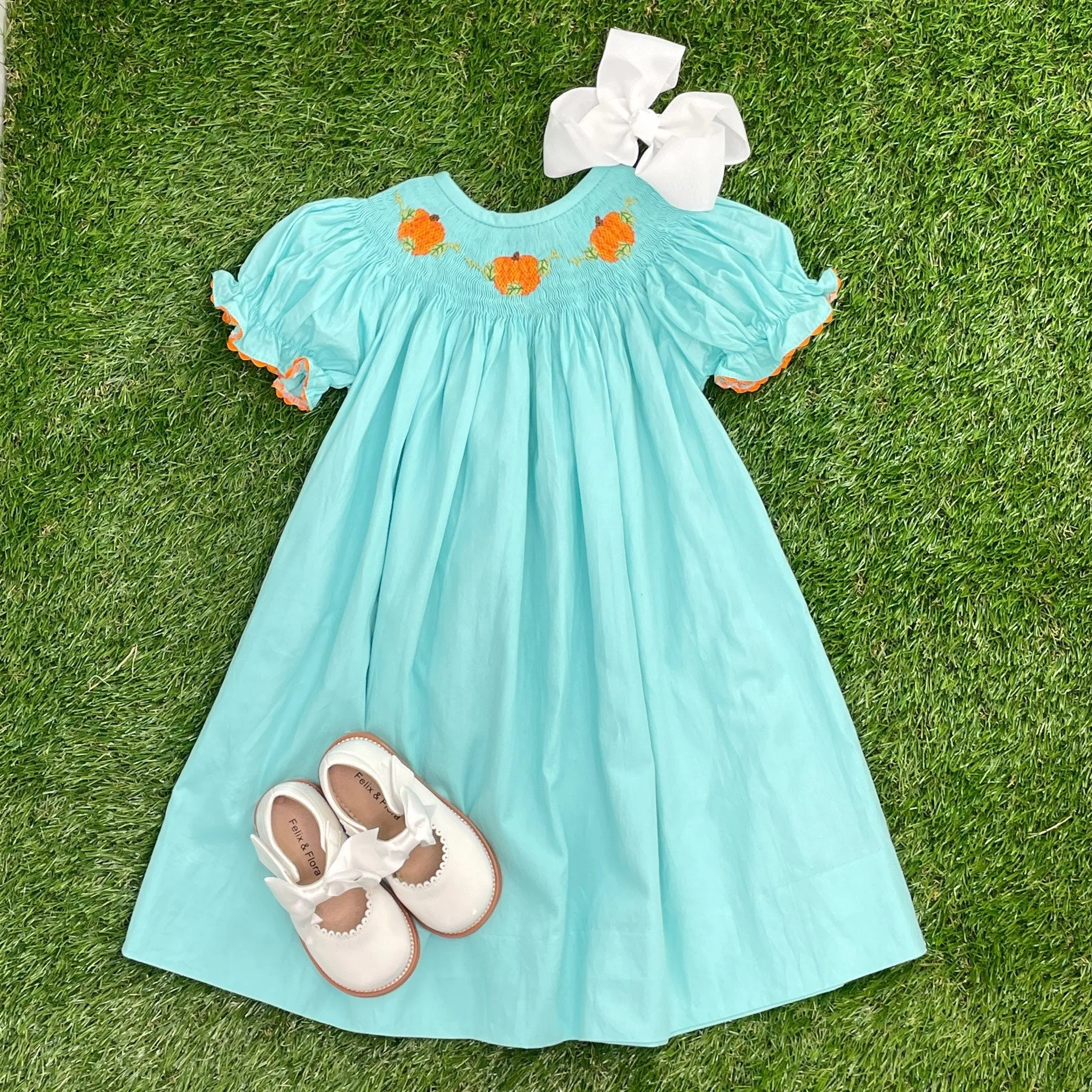 Smocked Pumpkin Bishop Dress in teal